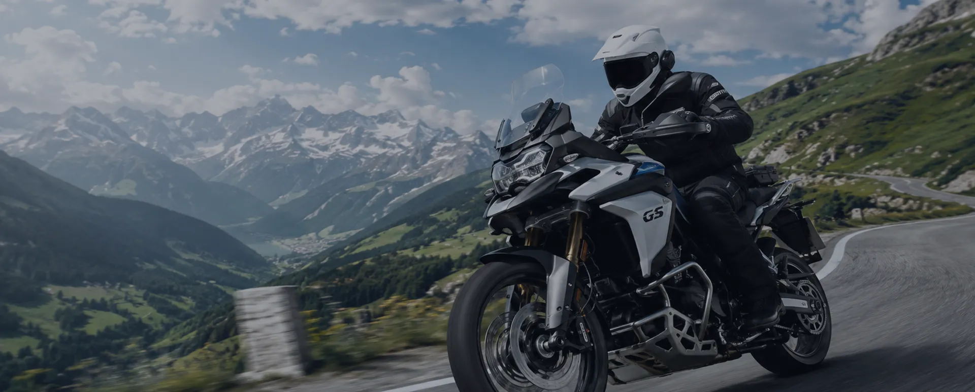 Motorcycle rider on a mountain road
